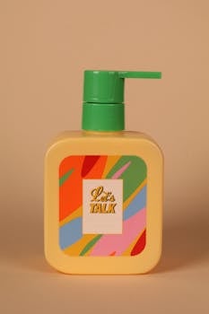 Unused soap dispenser in public bathroom